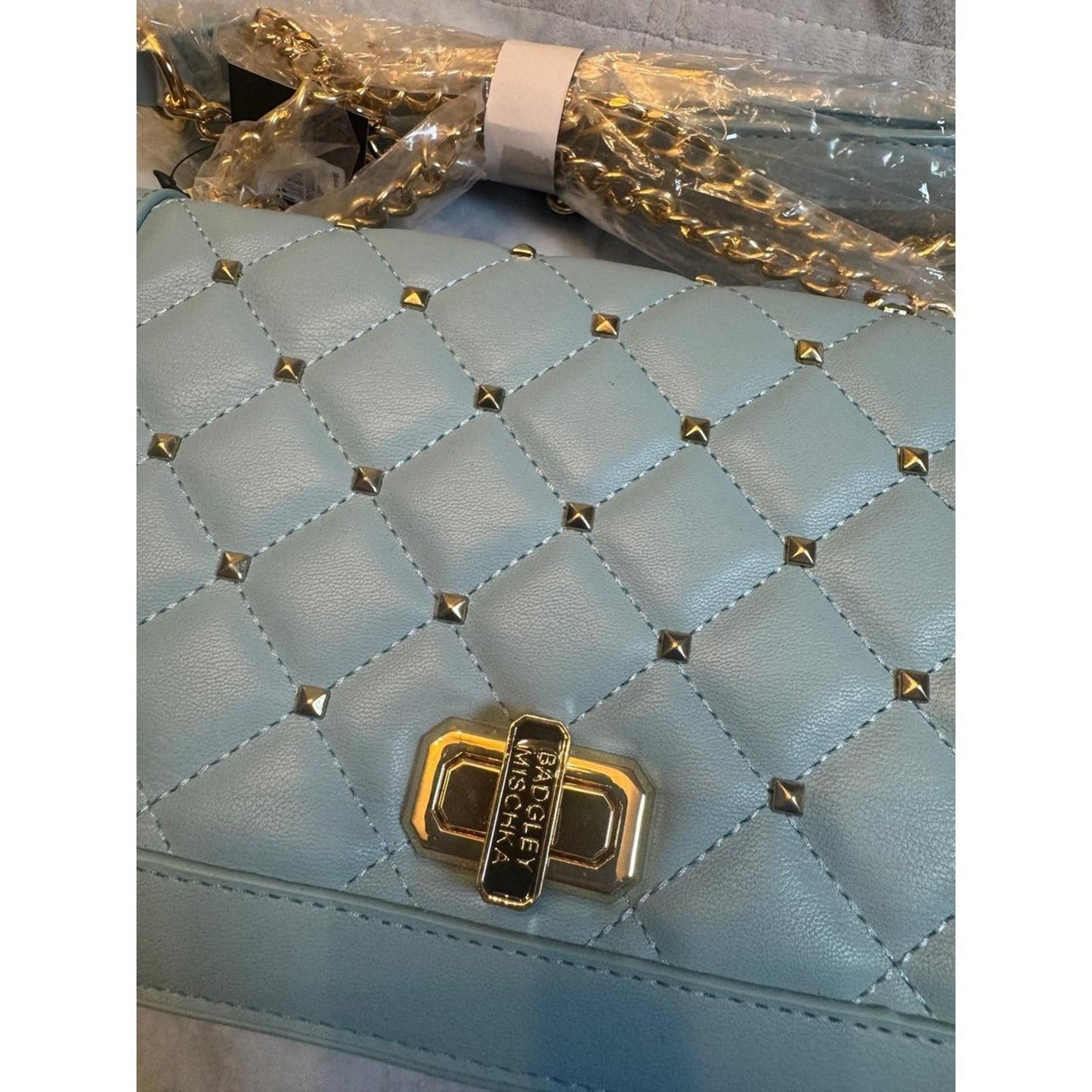 Badgley mischka blue quilted studded