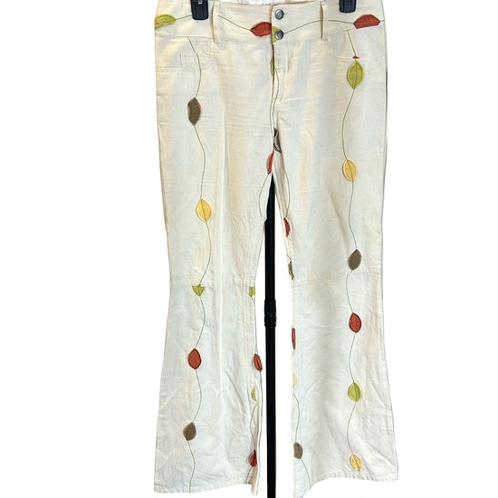 Alice + Olivia Cream Flare Pants with Multicolor Leaf Design