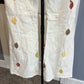 Alice + Olivia Cream Flare Pants with Multicolor Leaf Design