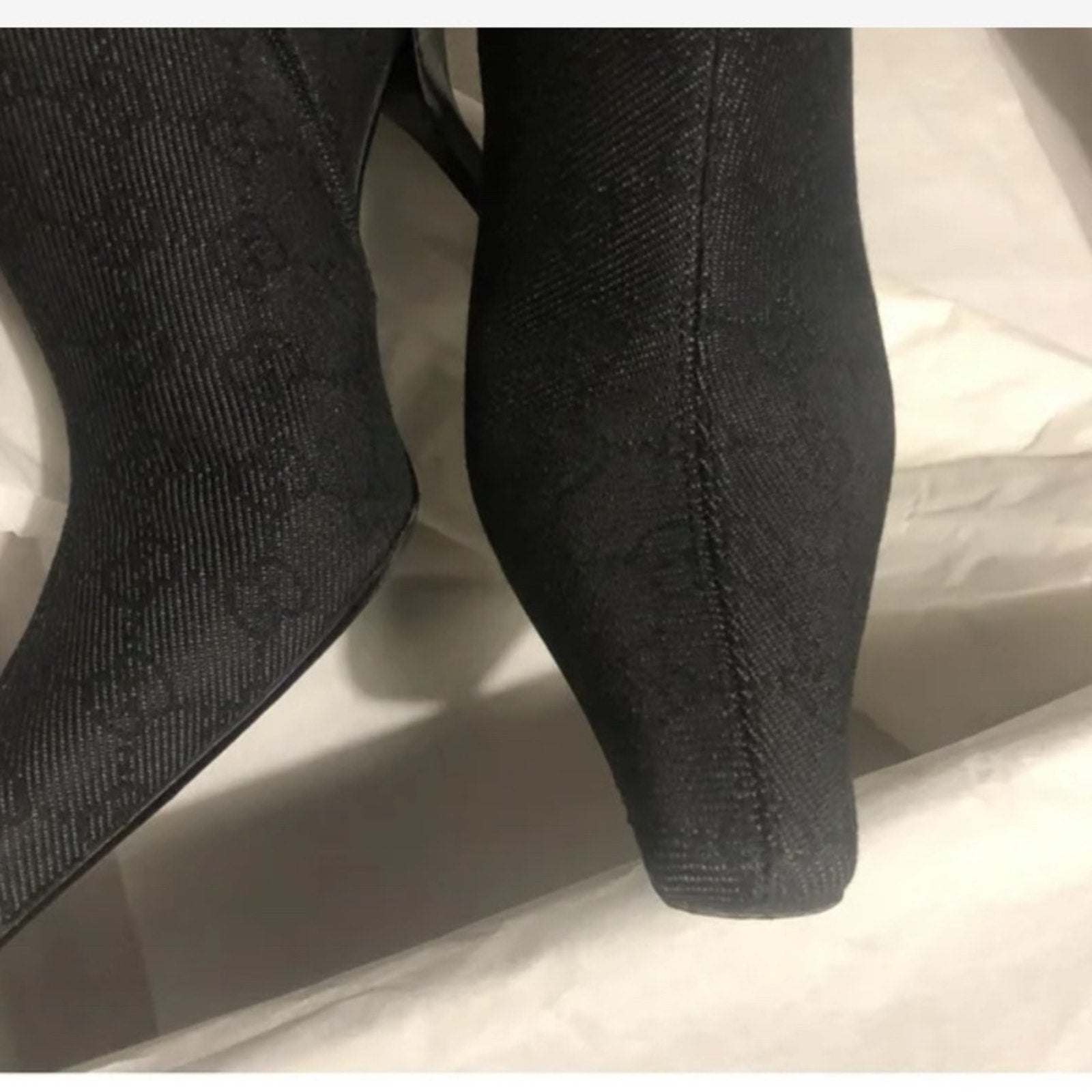Gucci Monogrammed Black Heeled Boots with Sophisticated Style