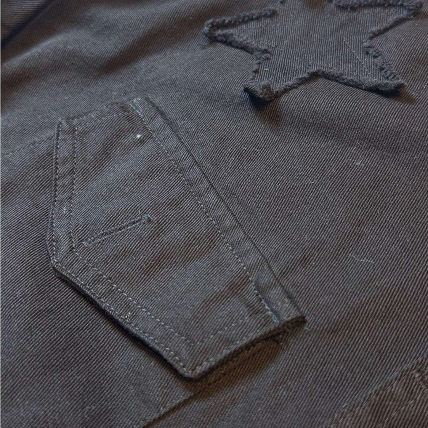 Star power Cropped Sundry utility jacket in black with raw edge starsNWT. Size M