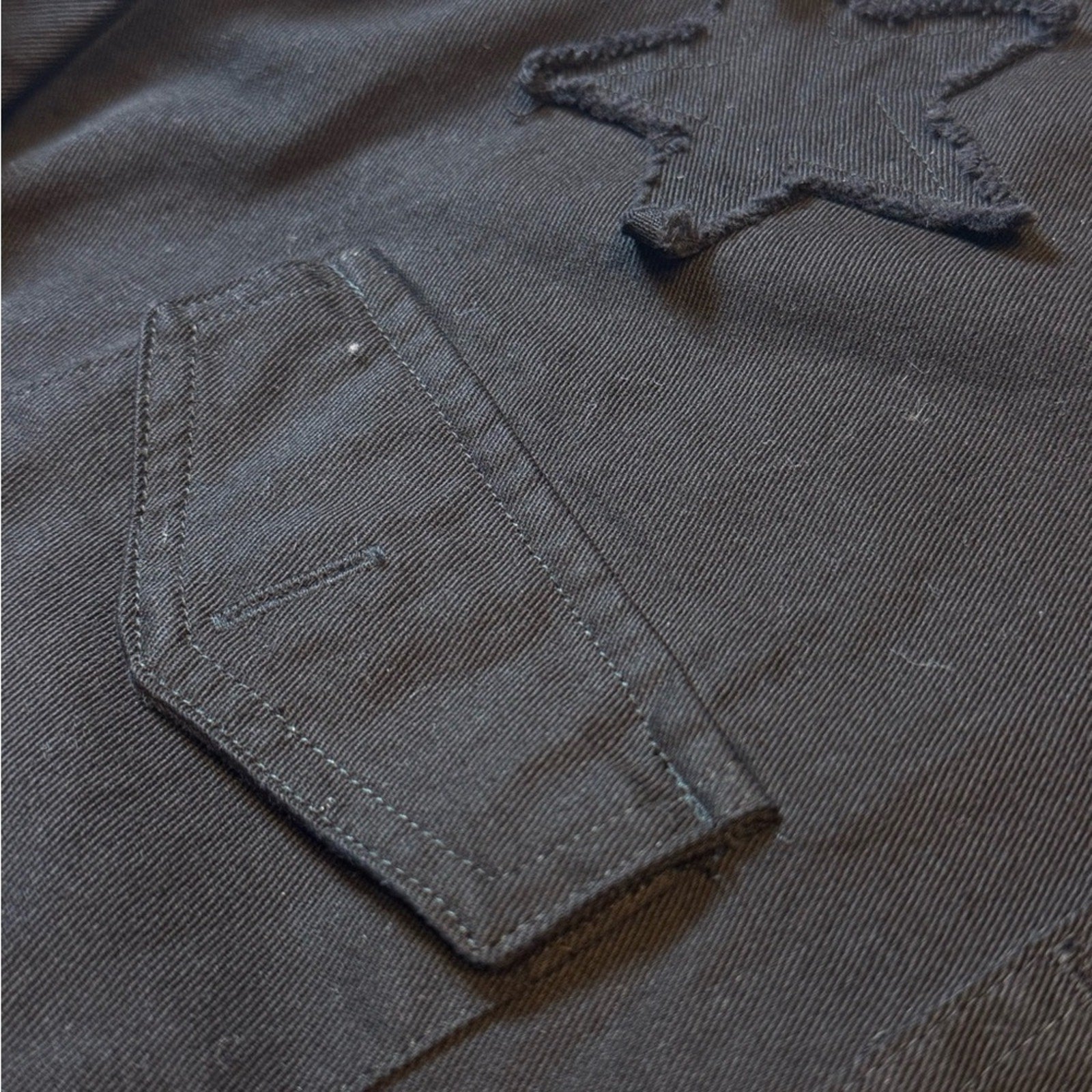 Star power Cropped Sundry utility jacket in black with raw edge starsNWT. Size M