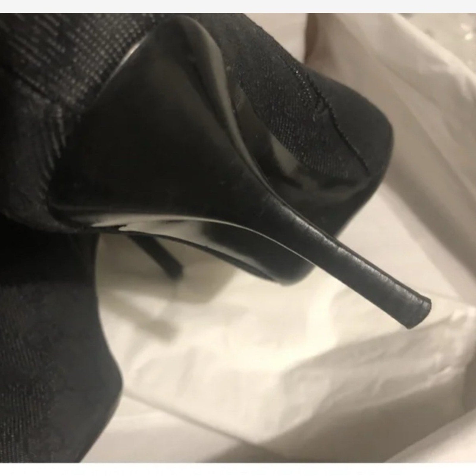 Gucci Monogrammed Black Heeled Boots with Sophisticated Style