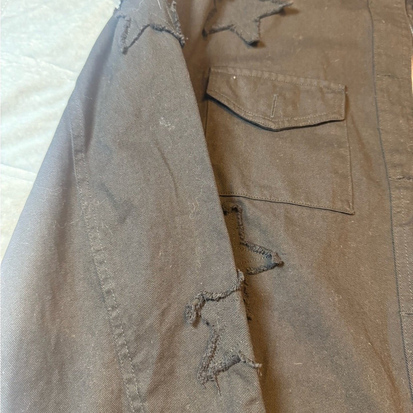 Star power Cropped Sundry utility jacket in black with raw edge starsNWT. Size M