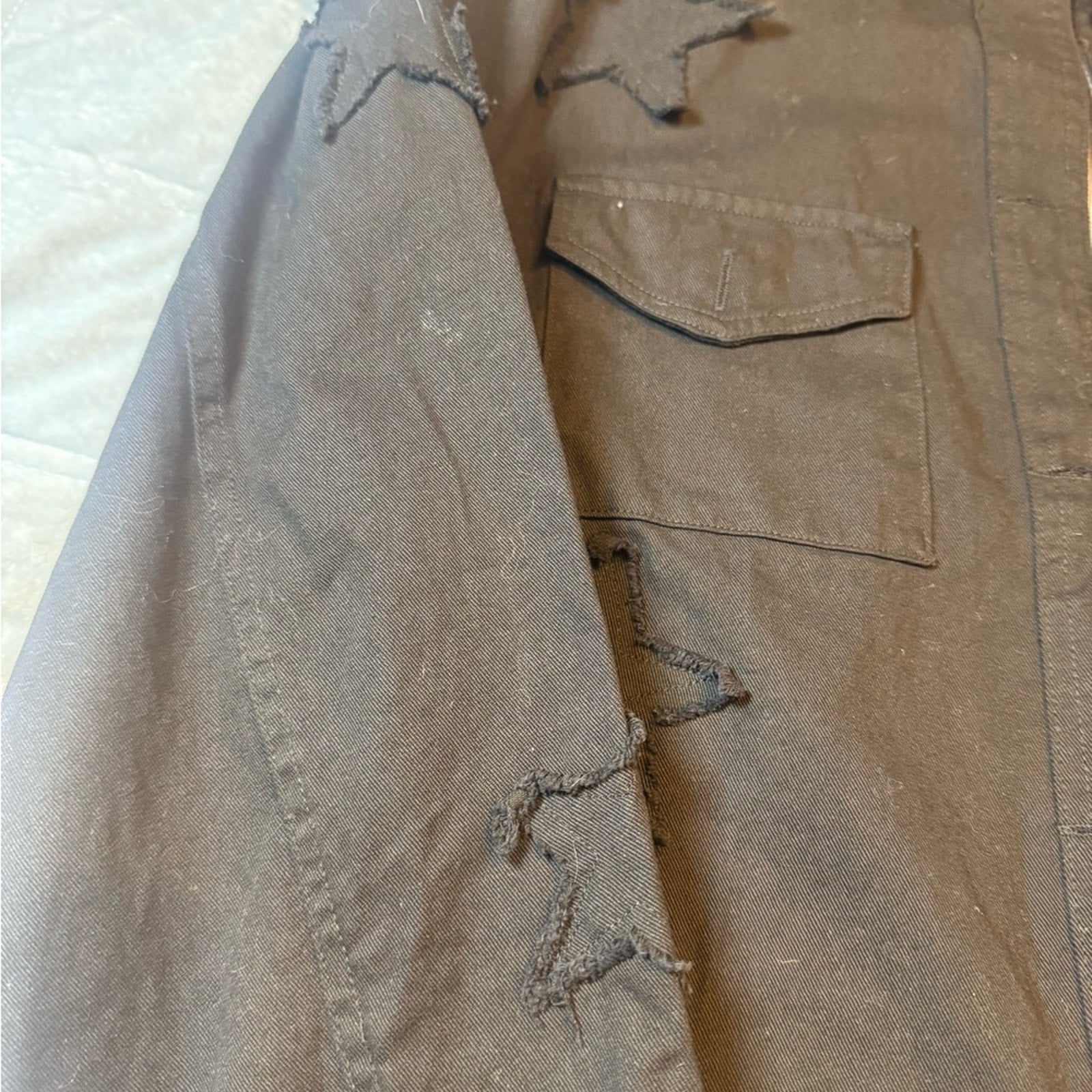 Star power Cropped Sundry utility jacket in black with raw edge starsNWT. Size M