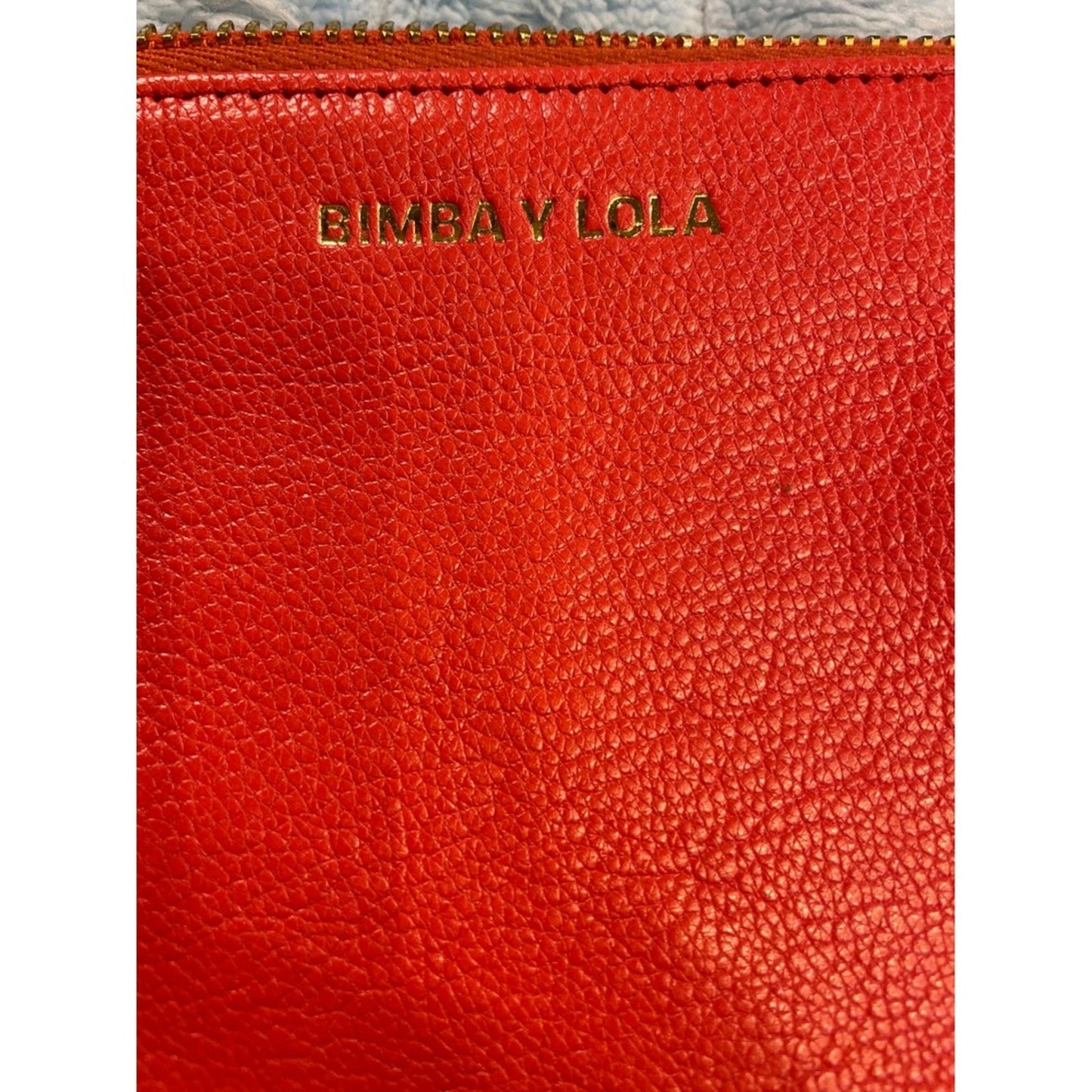 BIMBA Y LOLA Orange Leather Wristlet Clutch Wallet Gold Logo