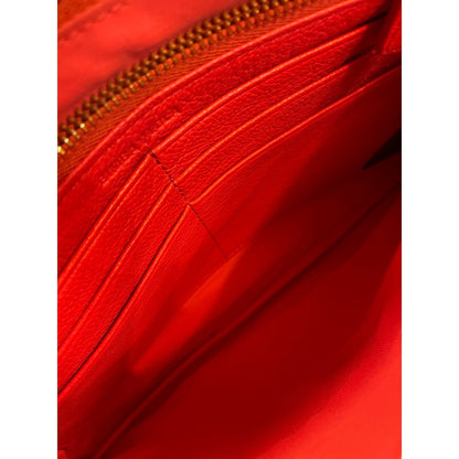BIMBA Y LOLA Orange Leather Wristlet Clutch Wallet Gold Logo