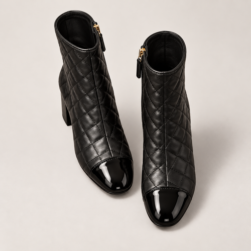 CHANEL black quilted suede patent cap-toe ankle boots